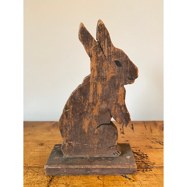 Vintage handmade hand painted primitive bunny rabbit. The initials of the woodworker are carved in the bottom. Very sweet.
