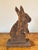 Vintage handmade hand painted primitive bunny rabbit. The initials of the woodworker are carved in the bottom. Very sweet.