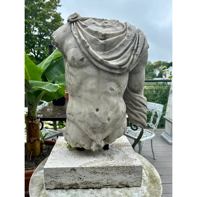 Roman Carved Marble Torso After the Antique. Beautifully sculpted in Grand Tour Style. With natural patina and weathering....
