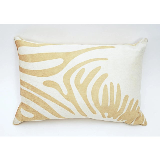 Stenciled Brazilian Cowhide, Beige on White Velvet back, Fiber insert This pillow is made using unique cowhides, with no...