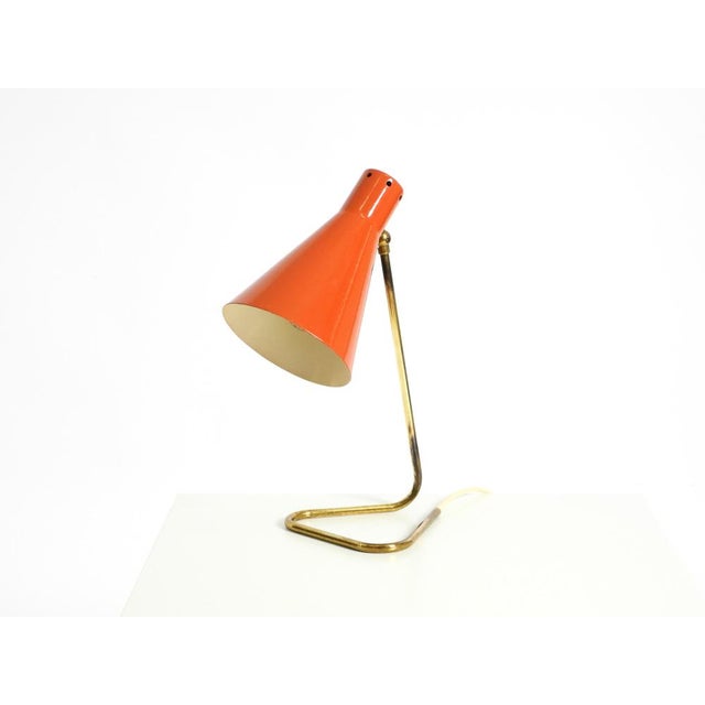 Large, beautiful, original 1950s table lamp. the base and neck are crafted from bent brass tubing, featuring internal...