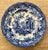 A beautiful antique set of nine English blue and white transferware dinner plates in the classic “Ancient Ruins” pattern...