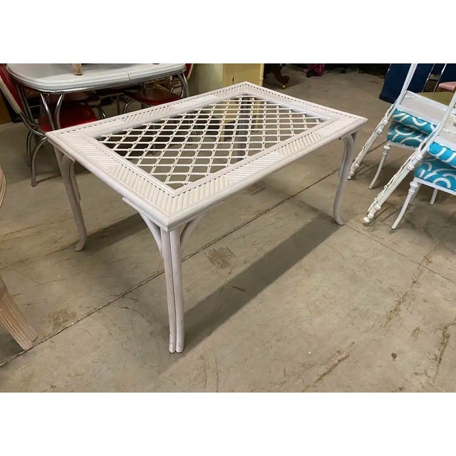 Up for consideration is a beautiful vintage white wicker dining table. This would look lovely in your home, and it is the...