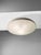 A rare and authentic circular ceiling light inspired by space, modernist, space-age, free-form, circular body with an...