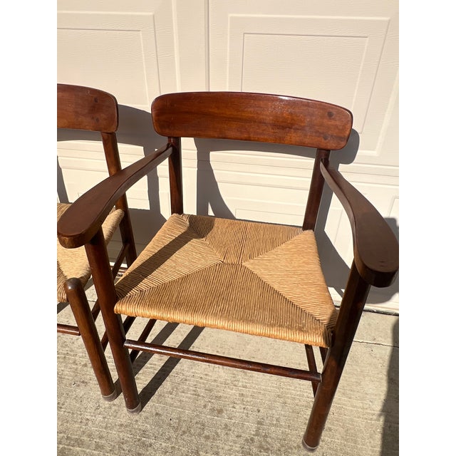 Rustic and Timeless dining chairs made of wood with rattan seats. In very good condition with light signs of age related...