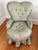 A petite 1940s ladies chair in a light sage green damask upholstery. Finished with a pretty ruffled skirt. A very Dorothy...