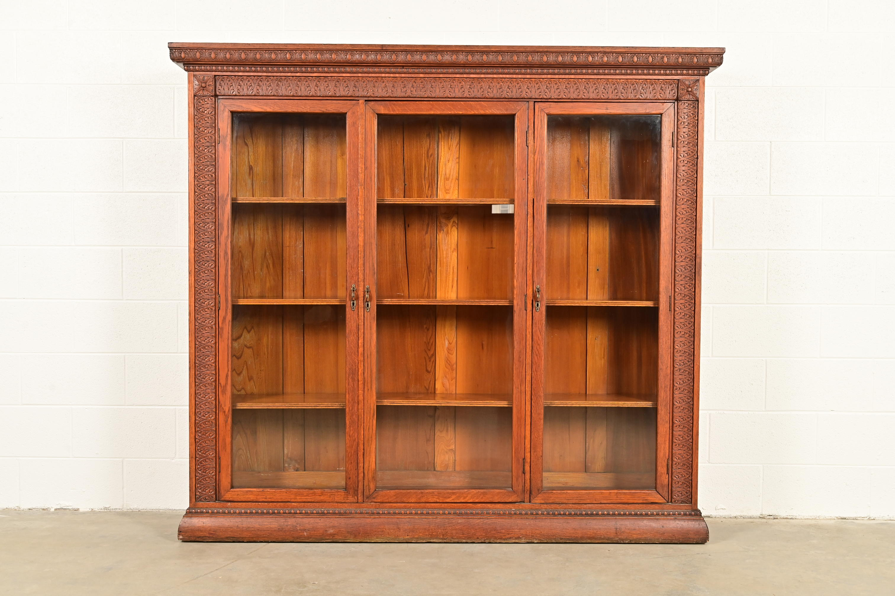R. J. Horner Style Antique Victorian Carved Oak Triple Bookcase