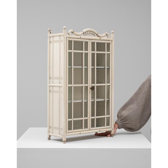 This charming 1910s French wooden mini showcase vitrine captures the delicate craftsmanship of early 20th-century design....