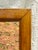 A charming antique French wood display frame featuring beautifully aged walnut-toned wood, delicate inner molding, and a...