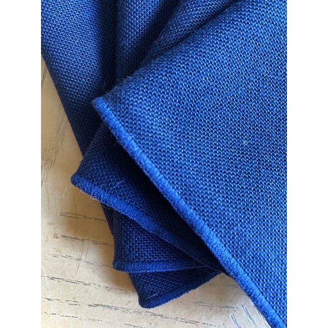 Set of four deep blue linen dinner napkins in luxurious pique weave. Unfolded, each is a generous 18.5" square. Not only...