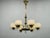 A sophisticated italian chandelier dating from the 1950s, combining elegant mid-century modern styling with timeless...