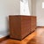 An elegant Mid-Century Modern two-piece dresser/credenza set crafted in teak wood veneer, featuring sleek clean lines,...