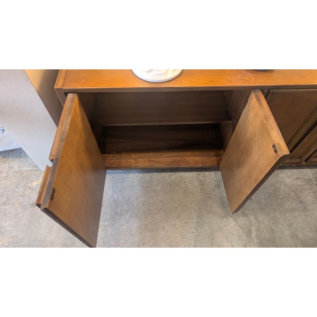 Elevate your living or dining space with this stunning, authentic Thomasville credenza. Known for their high-quality...