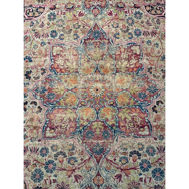 This exceptional antique Persian Kerman rug, dating to the mid 19th century, embodies the refined elegance and intricate...