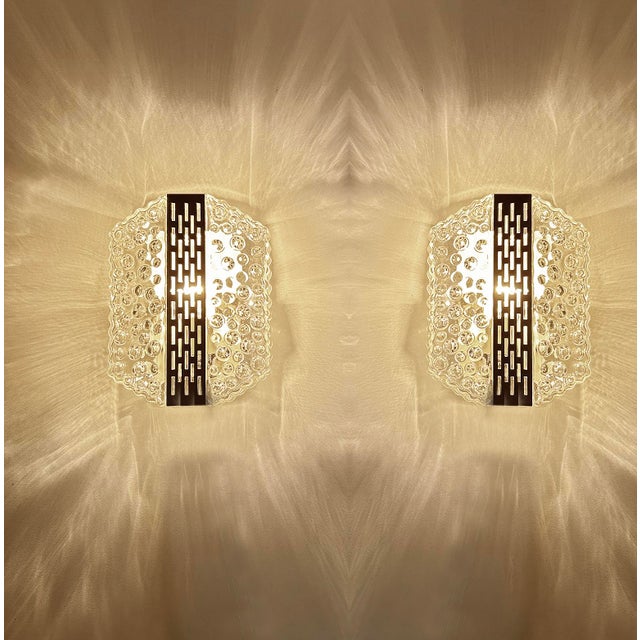 Pair of vintage bubble glass sconces featuring an hexagonal bubble glass shade with a center louvered chrome band, silver...
