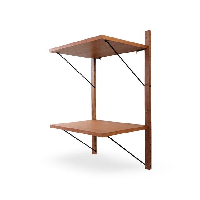Beautiful, large wall shelf from the traditional Danish manufacturer Cado, dating from the 1960s. Designed by Poul...