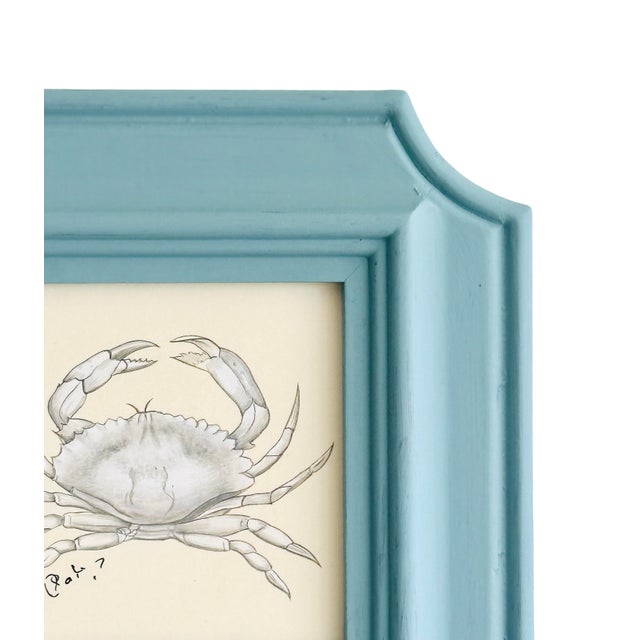 This hand-painted crab is done in soft white and and gray tones, with fine linework and subtle shading that highlights the...