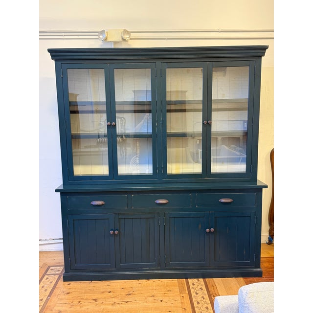 Design Plus Gallery presents the Napa Farmhouse Sideboard + Glass Door Hutch from Vintage Mill Werks. This farmhouse-style...
