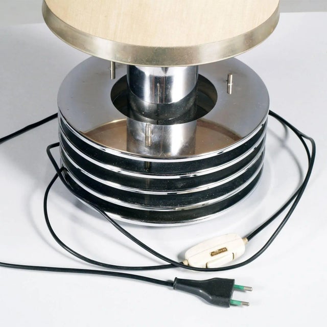 This Austrian table lamp is made of chromed steel and is reminiscent of designs by Gaetano Sciolari. Up to 250V (Europe/UK...