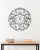 Scrolls of varying size are set in a round frame in this tea light wall sconce. The the design, with nine glass cups,...