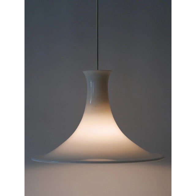 Elegant opaline glass pendant lamp or hanging light "mandarin". Designed by michael bang for holmegaard / royal...