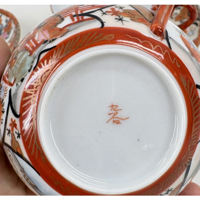 Pair of Antique Japanese Kutani Eggshell Porcelain Cups & Saucers Elevate your collection with this exquisite pair of...