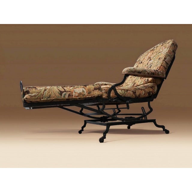 - Unique iron and caned folding Campaign-style reclining armchair or deck chair with adjustable positions, from upright to...