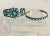 This Zuni Turquoise and Silver Bracelet Set Includes a bracelet of three flowers set on an engraved silver band. The...