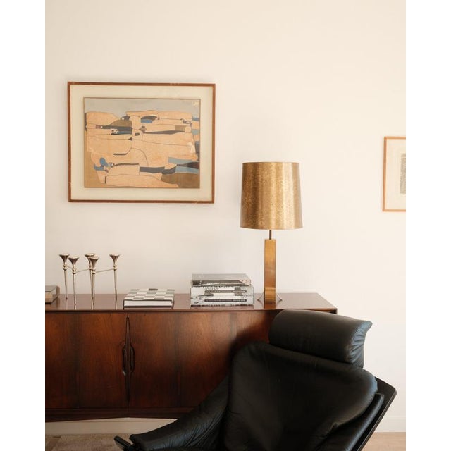 A sculptural pair of vintage table lamps from the late 20th century (circa 1970s–1980s). Each lamp features a solid brass...