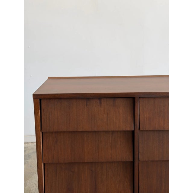 W63 D18 H30.5 Gorgeous vintage louvered dresser, with 12 drawers. This piece has been fully refinished to highlight the...