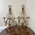 Up for sale is a gorgeous, matching pair of vintage Hollywood Regency style double-arm wall sconces. Crafted from heavy...