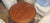 2008 Alfonso Marina Round Table with Star design inlay and trim. 39" W x 34" H. Some minor scuffs on the edge and feet....
