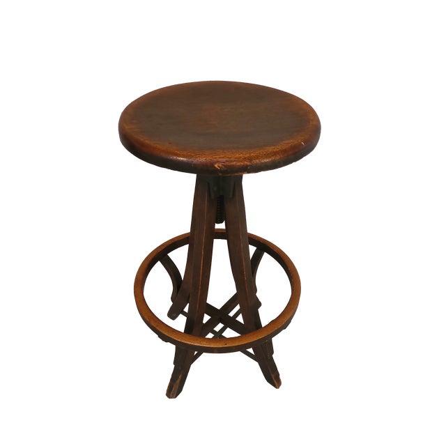 Here is an oak adjustable height stool from the early 20th century. Perfect working order with wear that you would expect...