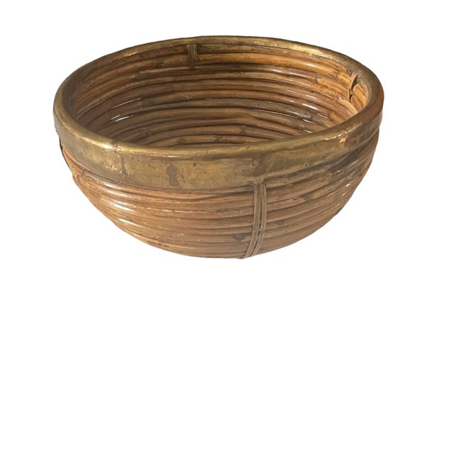 Beautiful pencil reed bamboo bowl with brass rim. Perfect for fruit or on a shelf. Circa 1970’s from Italy.