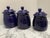Vintage deep blue speckled pottery ceramic storage canisters. Set of three.
