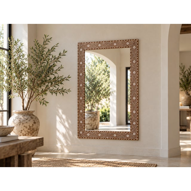 A masterpiece of patience and precision. This mirror draws its inspiration from ancient royal traditions, where furniture...