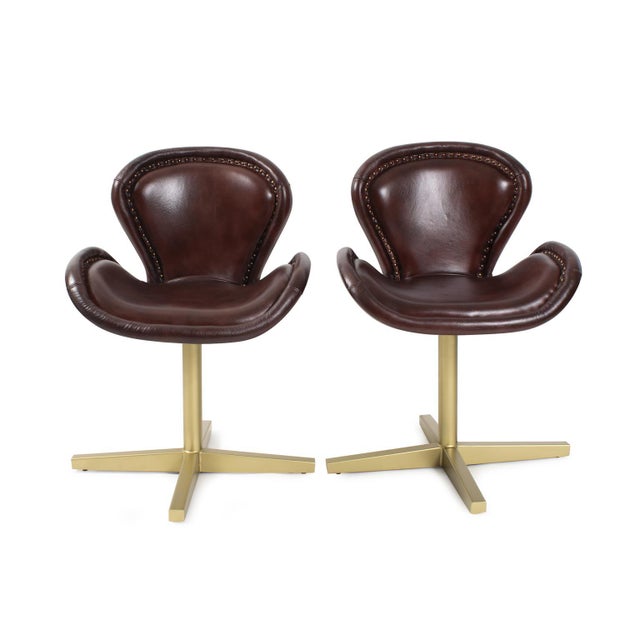 Each chair features deep, rich brown leather accented with nail heads along the stitching for added sophistication. With a...