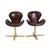 Each chair features deep, rich brown leather accented with nail heads along the stitching for added sophistication. With a...