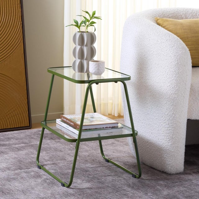 Step up your interior decor game with our Accent Tables. Stylishly crafted from sturdy iron and tempered glass, these...