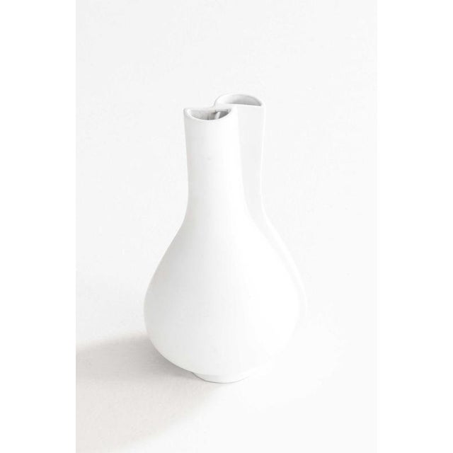 This rare stoneware vase, model surrea, was designed by wilhelm kåge and produced by gustavsberg in sweden. A member of...