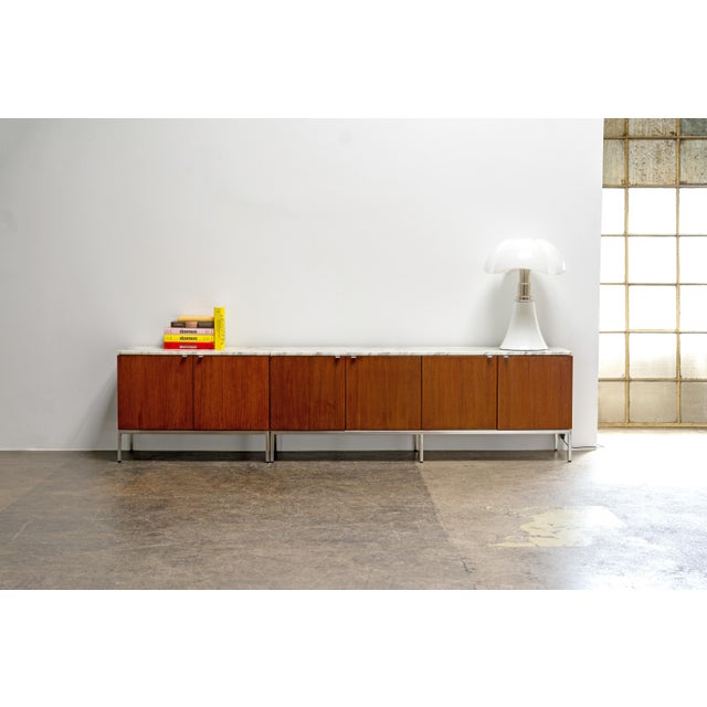 A rare pair of iconic sideboards designed by Florence Knoll for Knoll International in 1954, model 2544. Crafted from rich...