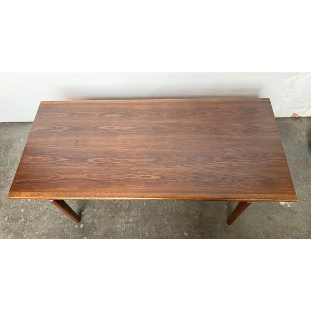 Coffee table in teak , with oak rims, possibly designed by hans j. Wegner and made in denmark in the 1960s. No labels...