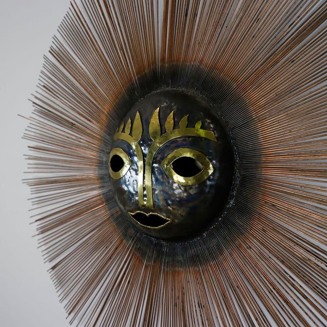 We offer this surreal brutalist sun sculpture in brass and bronze by Emaus Benedictine Monks, circa 1970. Emaus the name...