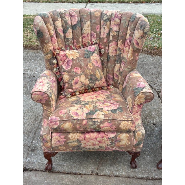 Pair of lovely French style channel back upholstered wingback chairs. The matched pair have slightly different builds, but...