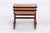 Vintage teak nesting tables in a clean Danish design. The striking, curved side panels and the neatly finished tabletops...