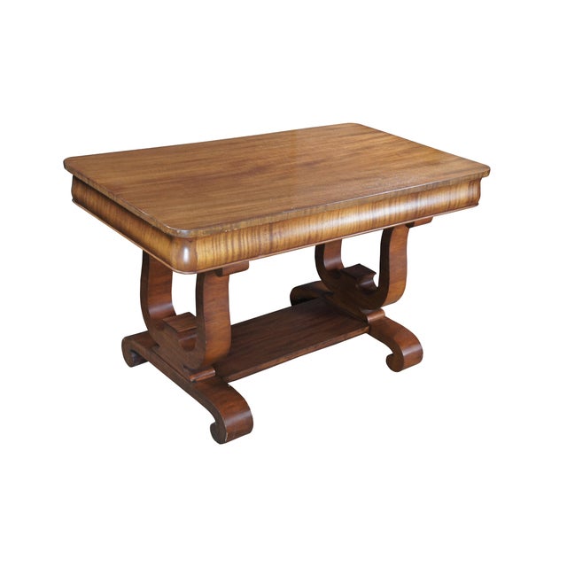Antique Mahogany library / parlor table / writing / partners desk featuring American Empire styling with a harp / lyre...