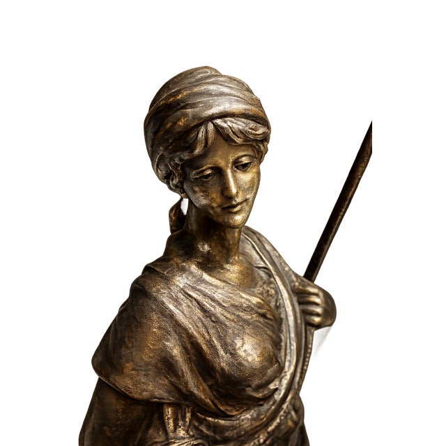 Antique French Spelter Figure "La Bucheronne" (The Wood Gatherer) on Original Wooden Pedestal A charming antique French...