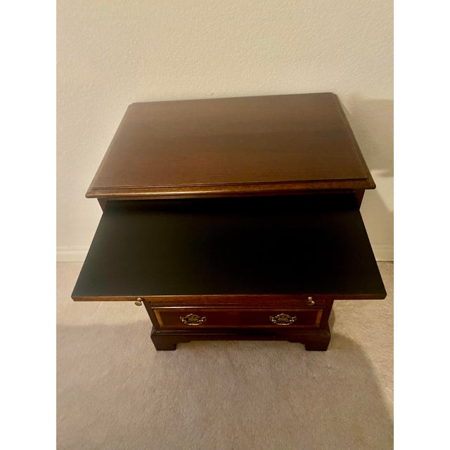 Vintage American Masterpiece Collection by Hickory Exquisite Banded Mahogany Four Drawer Chest. The chest has four...