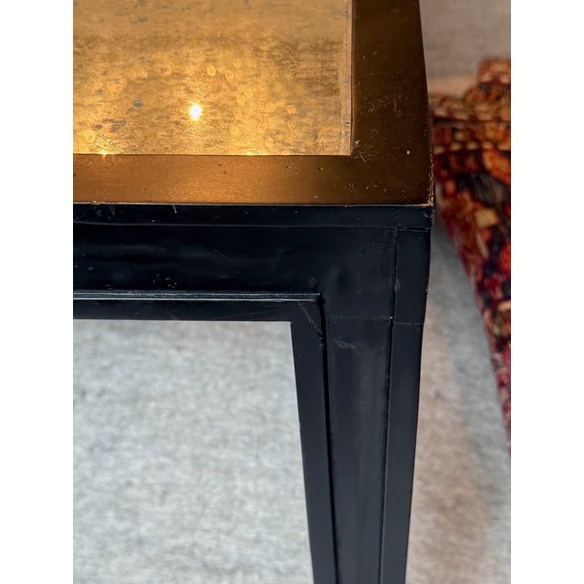 Noir Antiqued Mirrored Coffee Table Simple black open wood frame with an inset antiqued mirrored top. Would seamlessly fit...