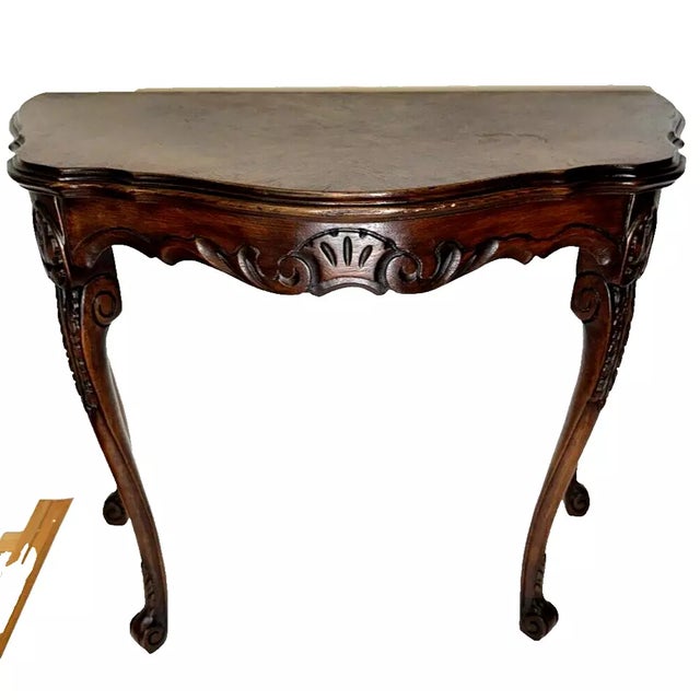 Wonderful little tea table with ornate cabriole legs and carved front. Lightweight and easy to move.